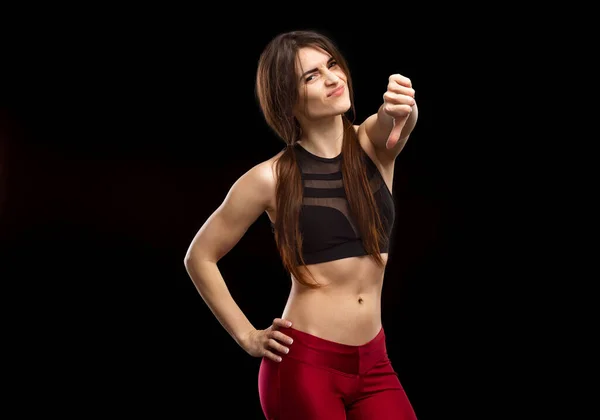 Young Slim Girl Trainer Shows Gestures Isolated Black Background — Stock Photo, Image