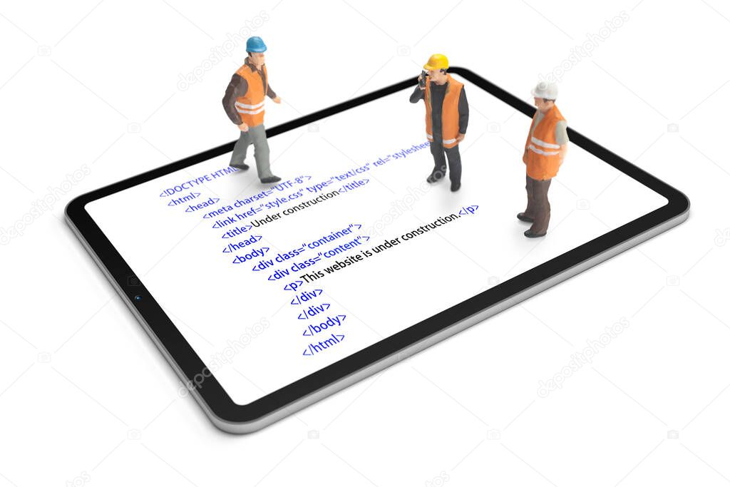 HTML website code (internet page) under construction on digital tablet. Construction worker figurines working on code