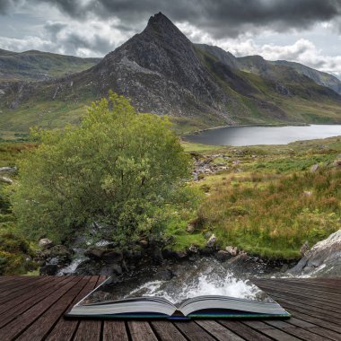 Stunning landscape image of countryside around Llyn Ogwen in Sno clipart