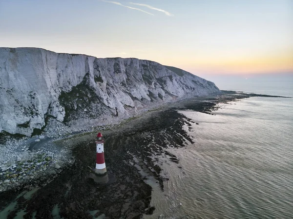 Stunning Aerial drone landscape image of lighthouse and chalk cl — Stock Photo, Image