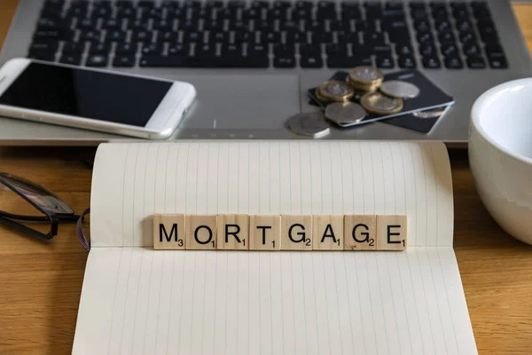 Concept keyword in wooden tile letters  mortgage in personal hom — Stock Photo, Image