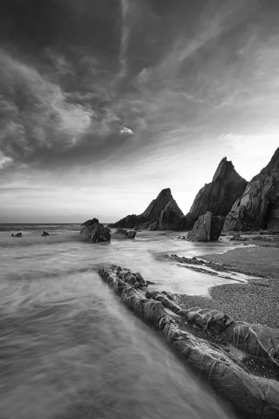 Stunning sunset landscape image of Westcombe Beach in Devon Engl — Stock Photo, Image