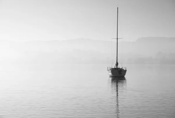 Stunning unplugged fine art landscape image of sailing yacht sit — Stock Photo, Image