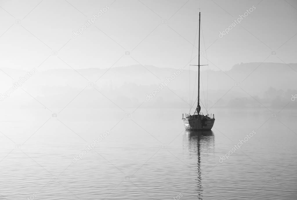 Stunning unplugged fine art landscape image of sailing yacht sit