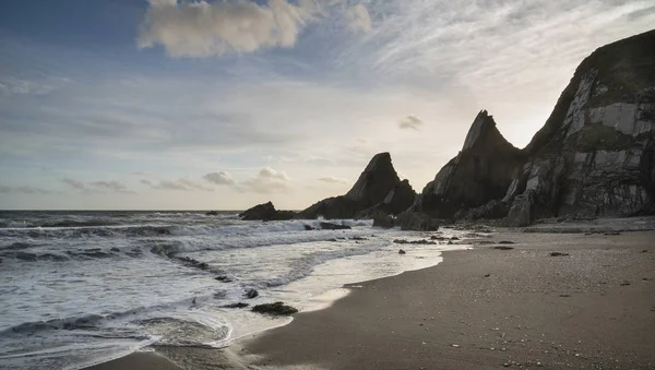 Stunning sunset landscape image of Westcombe Beach in Devon Engl — Stock Photo, Image