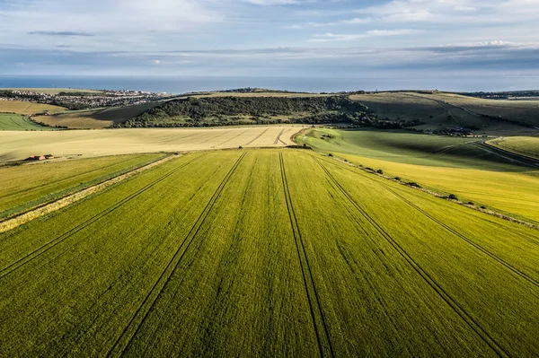 Beautiful drone landscape image of English countryside during late afternoon sunset Summer light