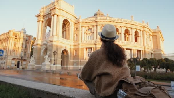 Woman Traveler Backpack Holding Dog Examines Architectural Monument Odessa Opera — Stock Video