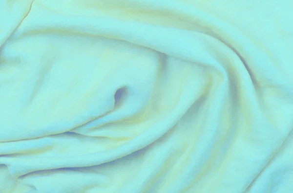 Close up crumpled azul algodão tecido fundo — Fotografia de Stock