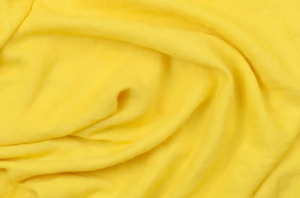 Chiudere stropicciato sfondo tessuto di cotone giallo — Foto Stock