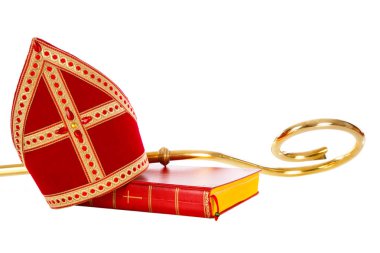 Gönye veya gönye kitap ve personel saint Nicholas. Beyaz kağıt üzerinde izole. Hollandalı bir Noel geleneğinin parçası