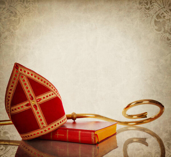 Mitre or mijter and staff of Sintercas.On vintage backgroud. Николаевская традиция
