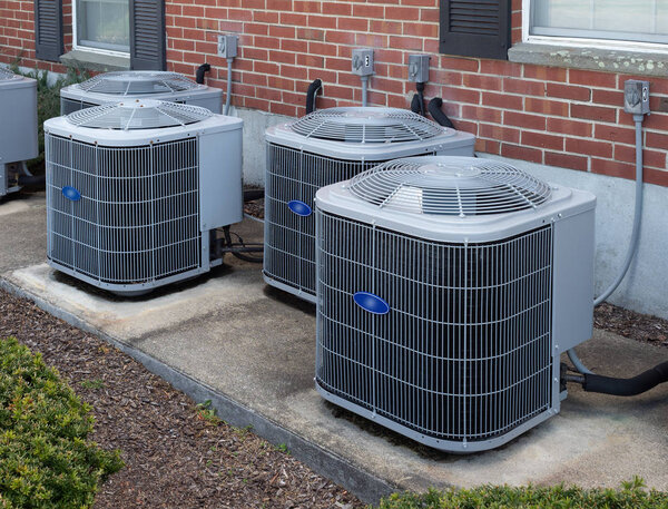 High efficiency modern AC-heater units, energy save solution-horizontal, outside an apartment complex