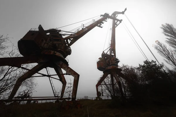 Rusty old industrial dock cranes at Chernobyl Dock, 2019