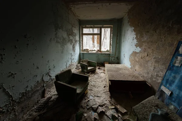 Abandoned room in damaged building