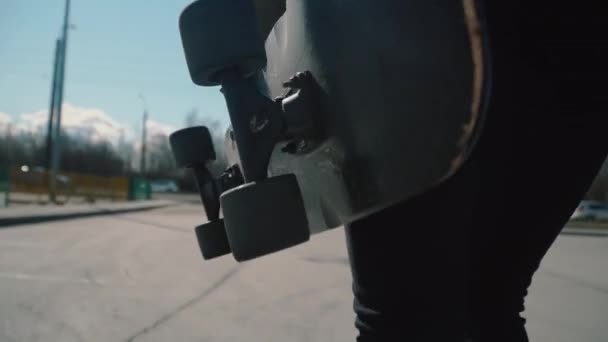 Young Caucasian Girl Riding Skateboard Parking Lot Quarantine Belt Coronavirus — Stockvideo