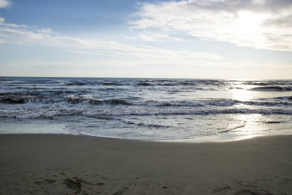 Beautiful summer sunset on the beach at Italy. Mediterranean sea - Province of Lucca - Provincia di Lucca - Italy