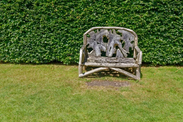 Vintage wooden garden bench seat — Stock Photo, Image