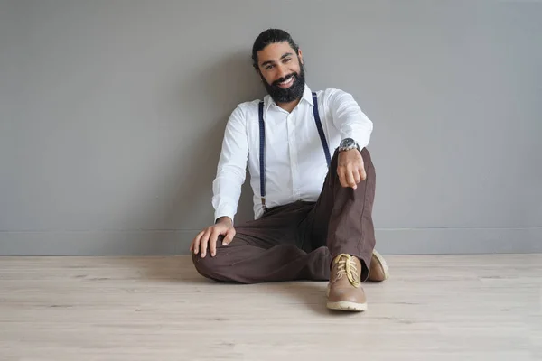 Hipster Guy Suspenders Sitting Floor Isolated — Stock Photo, Image