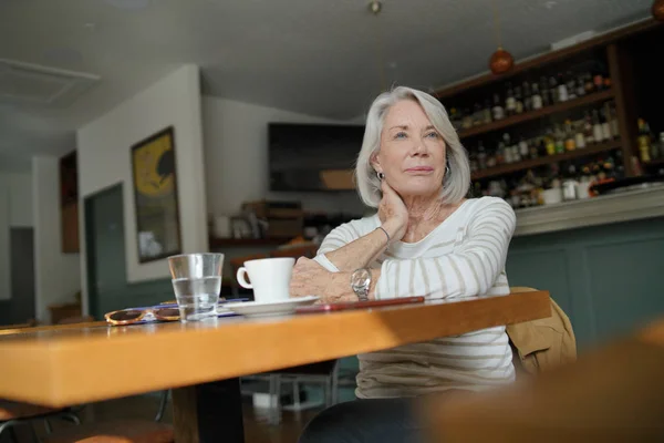 Elegant Senior Woman Thinking Restaurant — Stock Photo, Image