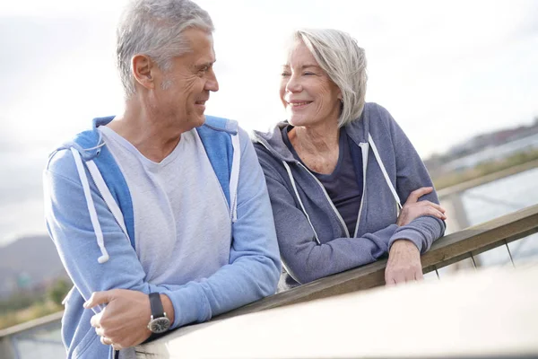 Healthy Senior Couple Smiling Eachother Outdoors — Stock Photo, Image