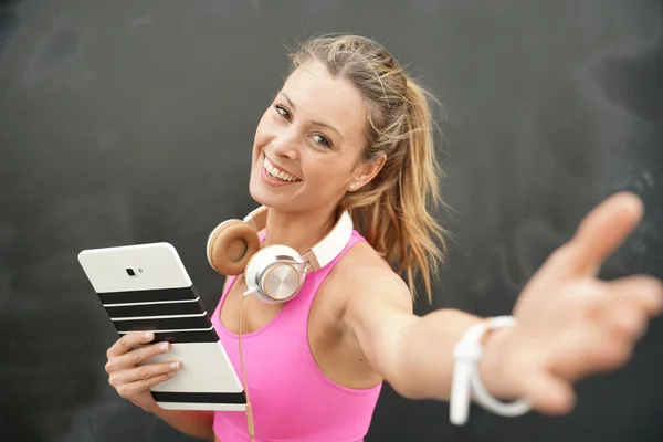 Happy Fitness Instructor Tablet Welcoming You Black Background — Stock Photo, Image