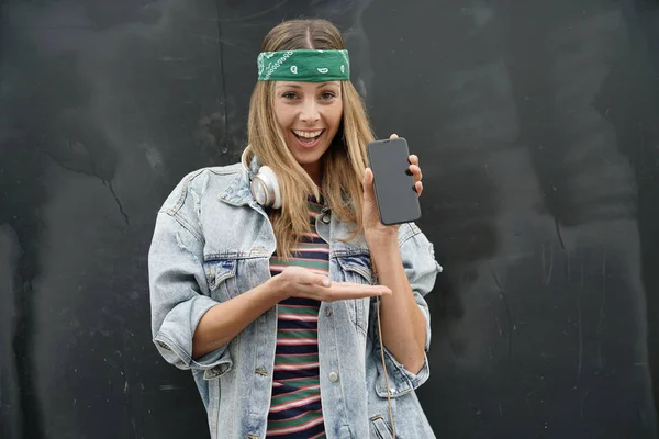 Dynamic Happy Young Student Showing Cellphone Black Background — Stock Photo, Image