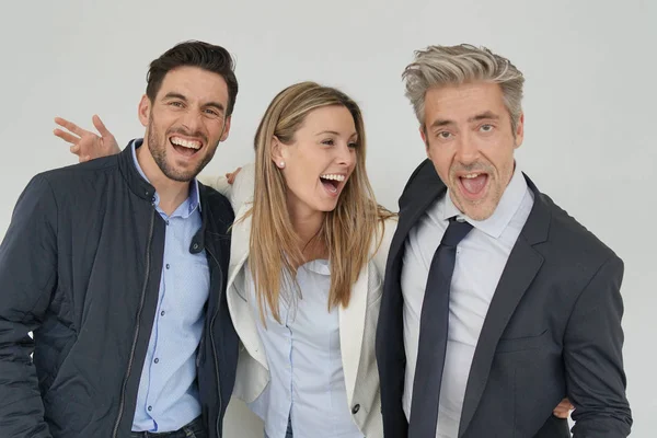 Colegas Trabalho Dinâmicos Sorrindo Juntos Fundo Cinza — Fotografia de Stock