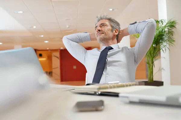 Mature Businessman Relaxing Desk Office — Stock Photo, Image