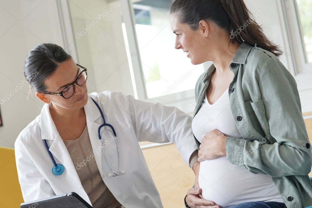 Pregnant woman at doctor's office