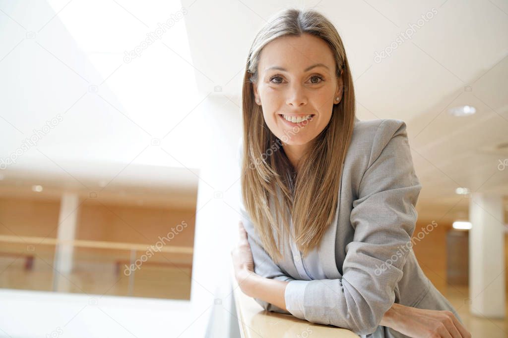 Attractive businesswoman in contemporary office