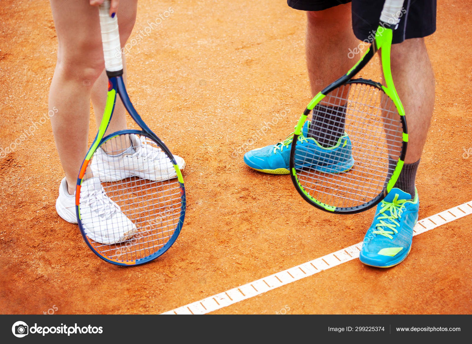 Closeup Of Tennis Players Holding Rackets Stock Photo Image By C Luckyraccoon