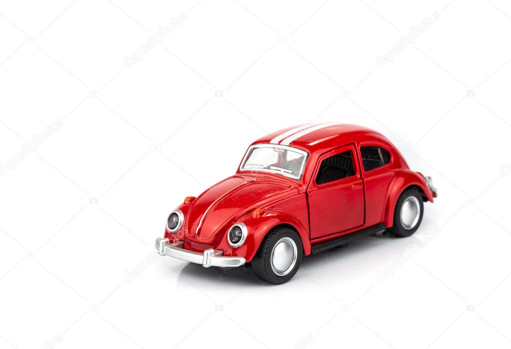red toy car isolated on white background.
