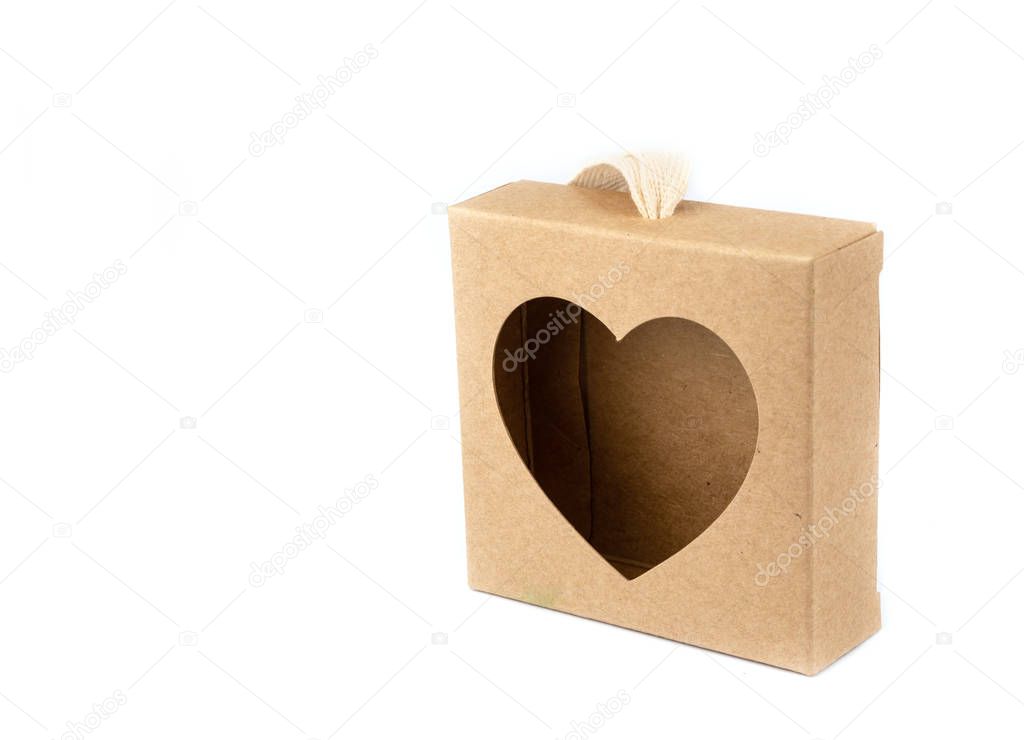 brown paper box with Heart shape window on white background.