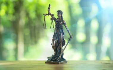 The Statue of Justice - lady justice or Iustitia / Justitia the Roman goddess of Justice clipart