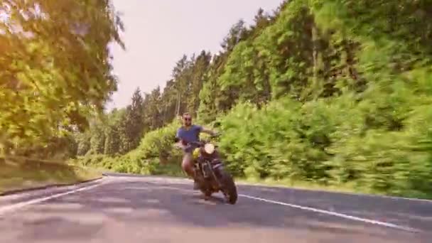 Modern Custom Scrambler Motorbike Forest Road Riding Overtaking Carving Actions — Stock Video