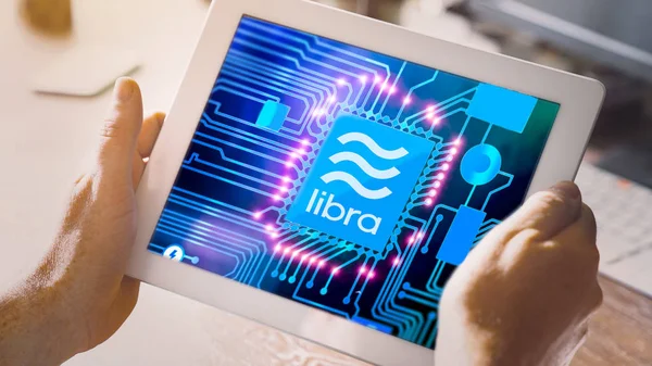 Libra and 27 membership organizations logos on tablet pc — Stock Photo, Image