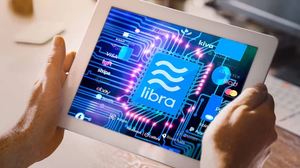 Libra and 27 membership organizations logos on tablet pc — Stock Photo, Image