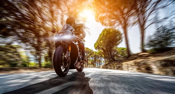 Motorbike having fun driving the empty road — Stock Photo, Image