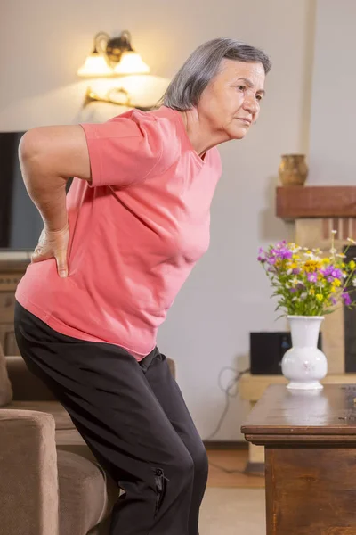Mature Woman Suffering Backache Home Massaging Lower Back Hand Feeling — Stock Photo, Image