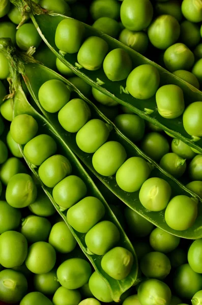 Fresh raw organic green peas close up photograph