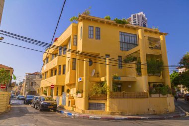 Tel Aviv, Israel - June 10, 2018: Building exteriors and streets in Neve Tzedek district of Tel Aviv, Israel. Near the old city of Jaffa, Neve Tzedek is the first Jewish settlement in Palestine. clipart