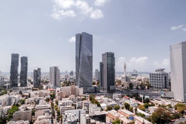 Tel Aviv-Yafo, Israel - June 12, 2018: Aerial view of the buildings and streets in Tel Aviv-Yafo, the cultural capital of the State of Israel. clipart