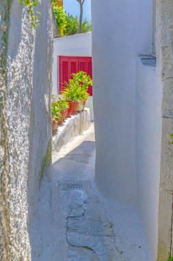 Architectural details from the narrow streets of Anafiotika, a traditional village in Athens, the Greek capital. Old neighborhood on the slopes of Acropolis, Greece. clipart