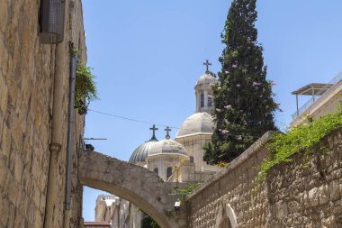 Ancient streets and buildings in the old city of Jerusalem. Jerusalem is the holy land to the Abrahamic religions; Judaism, Christianity and Islam. clipart