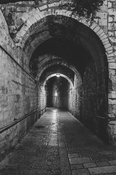 Ancient streets and buildings in the old city of Jerusalem at night