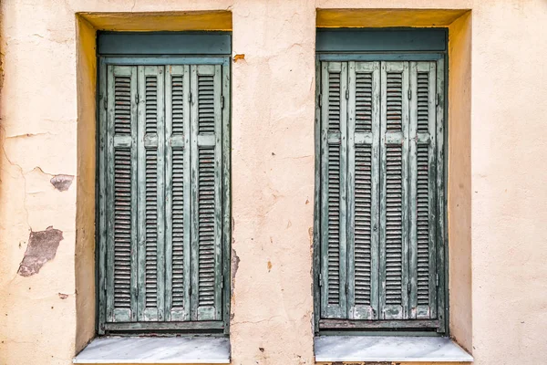 Windows with green wooden shutters — Stock Photo, Image