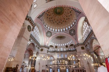 Istanbul, Turkey - July 29, 2020: Interior view of the Suleymaniye Mosque, located on the Third Hill of Istanbul. The mosque was commissioned by Suleiman the Magnificent and designed by Mimar Sinan. clipart