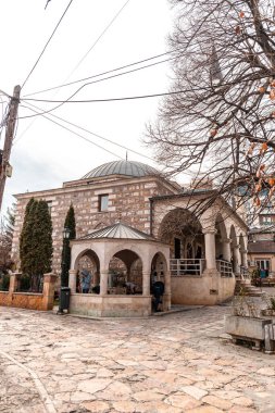 Skopje, North Macedonia - 7 FEB 2024: Arasta Mosque, Arasta Camii in Turkish, is an Ottoman era mosque located in the Old Bazaar of Skopje, North Macedonia. clipart