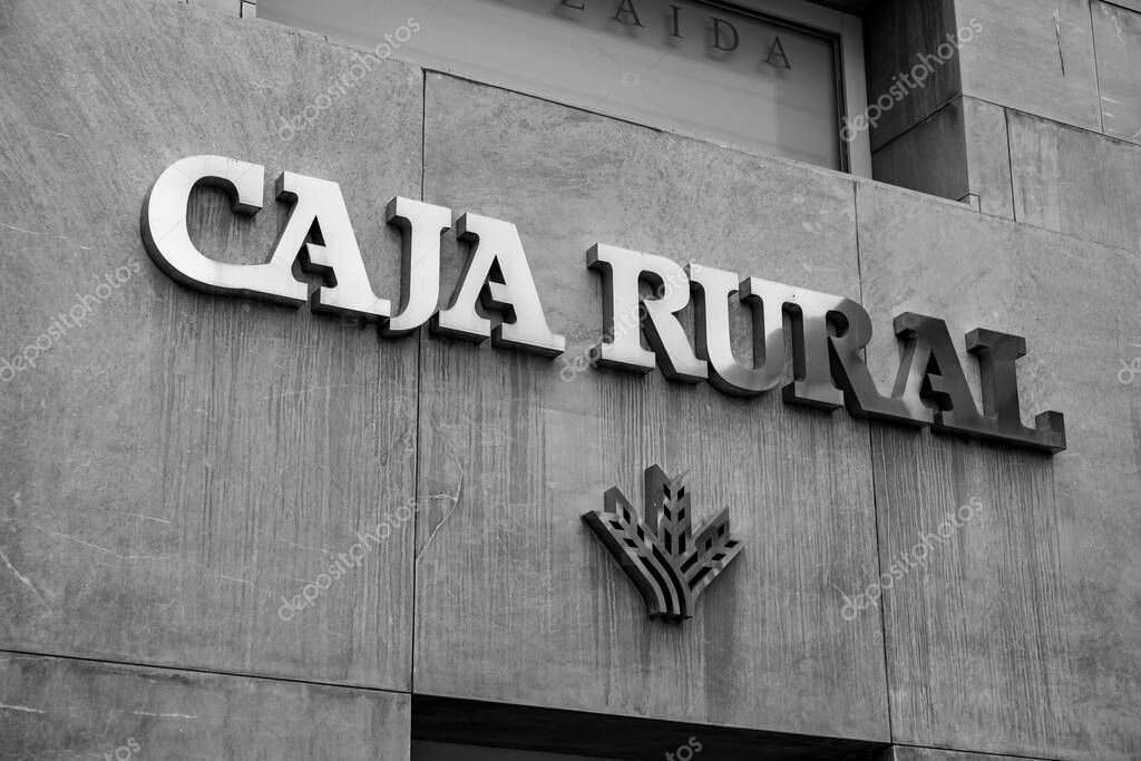 Granada, Spain - February 26, 2022: The Spanish Association of Rural Savings Banks, Caja Rural, is a group of credit cooperatives, branch in Granada.