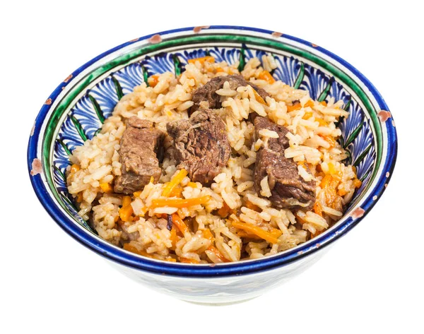 Beyaz arka plan üzerinde izole geleneksel seramik kase hazır plov (Orta Asya yemek Pilav et ve sebze ile) görünümünü yukarıda